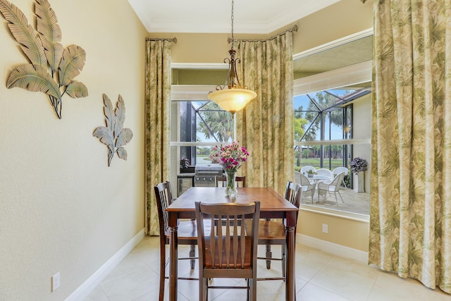 16988 SW Ambrose Way, Port Saint Lucie, FL 34986 - tiled dining area with baseboards and ornamental molding