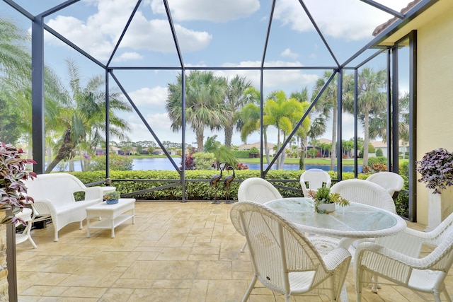 16988 SW Ambrose Way, Port Saint Lucie, FL 34986 - view of patio / terrace featuring a water view and a lanai