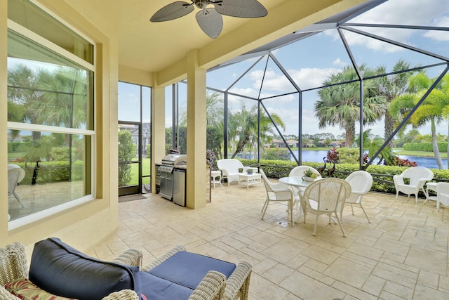 16988 SW Ambrose Way, Port Saint Lucie, FL 34986 - view of patio with glass enclosure, a water view, ceiling fan, and outdoor dining space