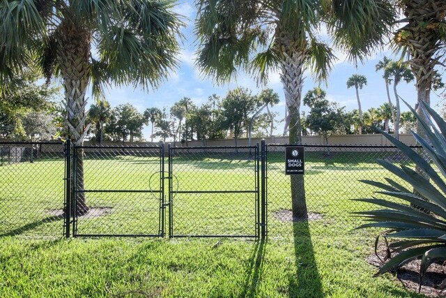 16988 SW Ambrose Way, Port Saint Lucie, FL 34986 - view of yard featuring fence and a gate