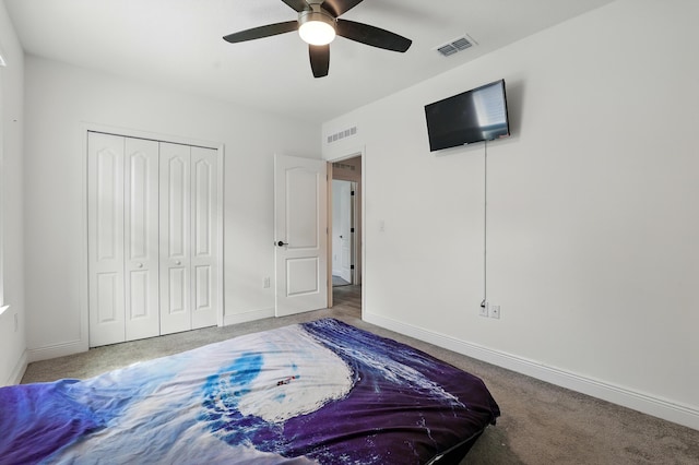 1041 SW Dartmouth Ave, Port Saint Lucie, FL 34953 - carpeted bedroom featuring visible vents, baseboards, a ceiling fan, and a closet