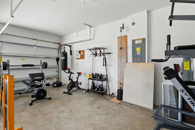 1041 SW Dartmouth Ave, Port Saint Lucie, FL 34953 - workout area with electric panel and concrete block wall