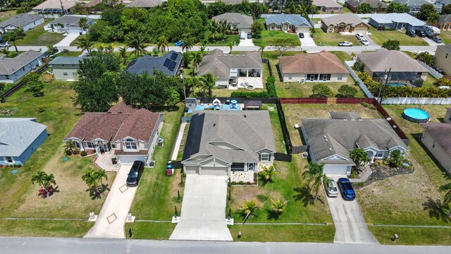 1041 SW Dartmouth Ave, Port Saint Lucie, FL 34953 - drone / aerial view with a residential view