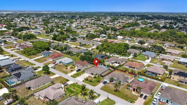 1041 SW Dartmouth Ave, Port Saint Lucie, FL 34953 - aerial view with a residential view