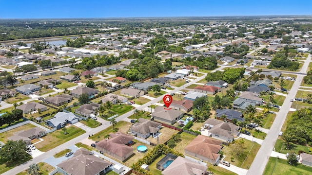 1041 SW Dartmouth Ave, Port Saint Lucie, FL 34953 - drone / aerial view with a residential view and a water view