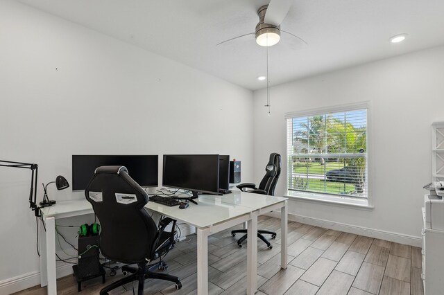 1041 SW Dartmouth Ave, Port Saint Lucie, FL 34953 - office with recessed lighting, light wood-style flooring, baseboards, and a ceiling fan
