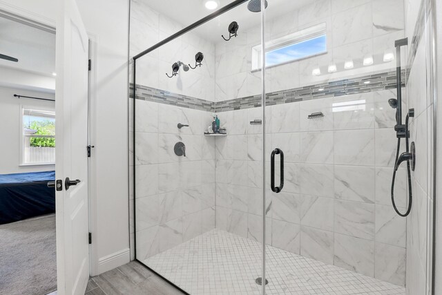 1041 SW Dartmouth Ave, Port Saint Lucie, FL 34953 - bathroom with a shower stall and ensuite bathroom