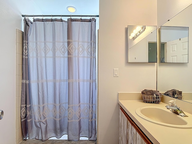 5005 Laguna Bay Cir Unit 26, Kissimmee, FL 34746 - full bathroom with vanity and a shower with curtain