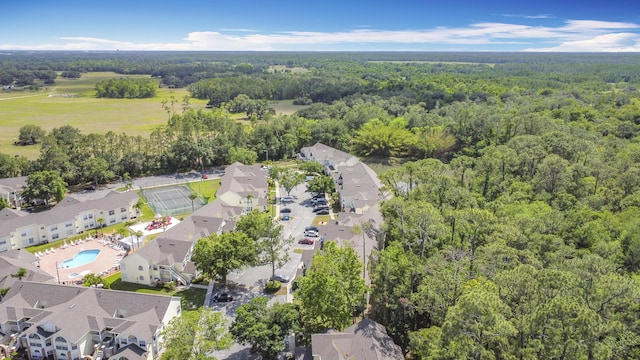 5005 Laguna Bay Cir Unit 26, Kissimmee, FL 34746 - birds eye view of property with a residential view and a forest view