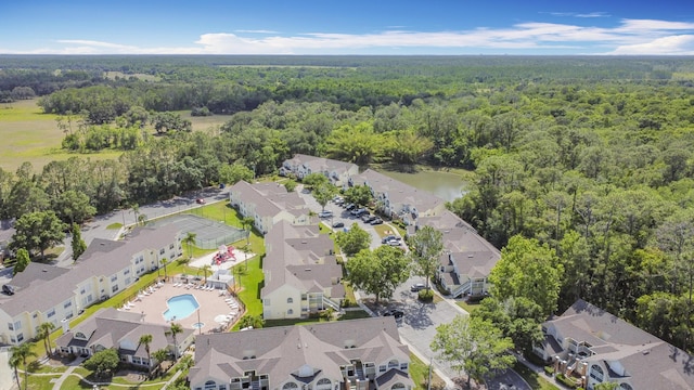 5005 Laguna Bay Cir Unit 26, Kissimmee, FL 34746 - bird's eye view featuring a residential view and a wooded view