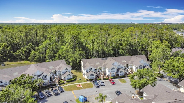 5005 Laguna Bay Cir Unit 26, Kissimmee, FL 34746 - birds eye view of property with a residential view and a forest view