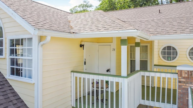 5005 Laguna Bay Cir Unit 26, Kissimmee, FL 34746 - entrance to property featuring a shingled roof