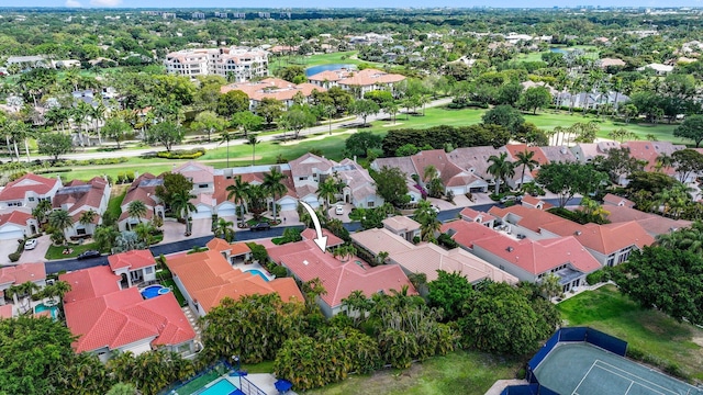 aerial view featuring view of golf course and a residential view