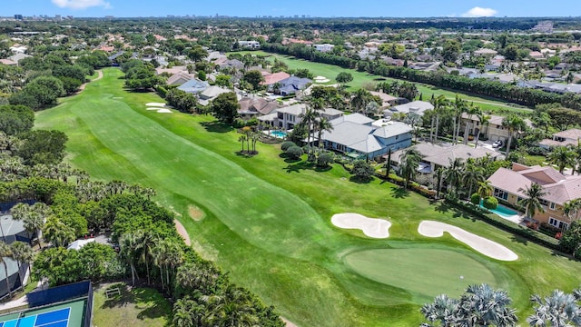 birds eye view of property featuring golf course view and a residential view