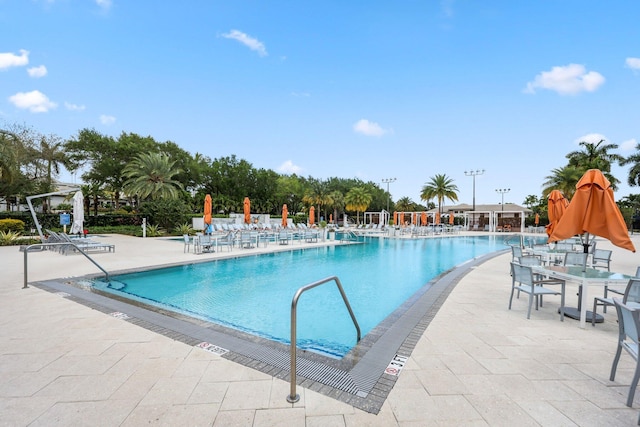 pool featuring a patio