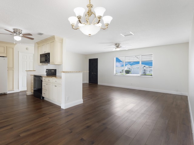 kitchen featuring cream cabinets, ceiling fan with notable chandelier, black appliances, and dark wood-type flooring