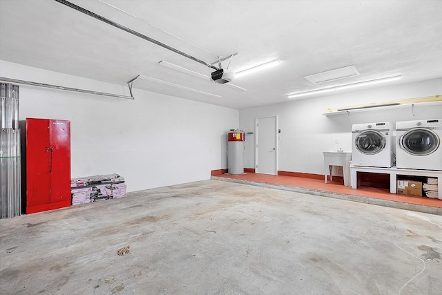 4800 Harrison St, Hollywood, FL 33021 - garage with washer and clothes dryer, water heater, a garage door opener, and a sink