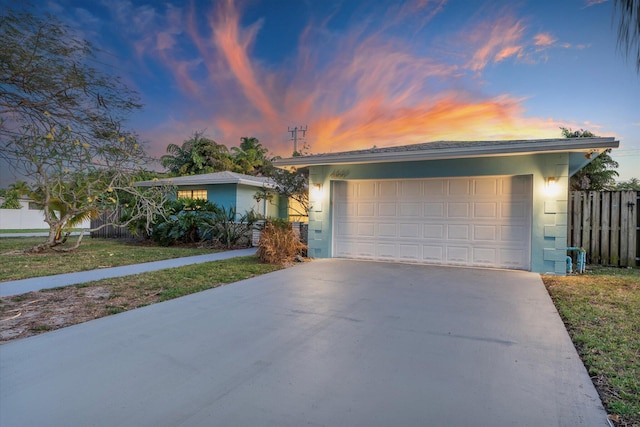 4800 Harrison St, Hollywood, FL 33021 - single story home with stucco siding, a garage, and concrete driveway