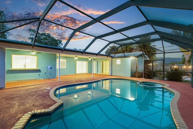 4800 Harrison St, Hollywood, FL 33021 - view of pool featuring a patio, a ceiling fan, a pool with connected hot tub, and a lanai