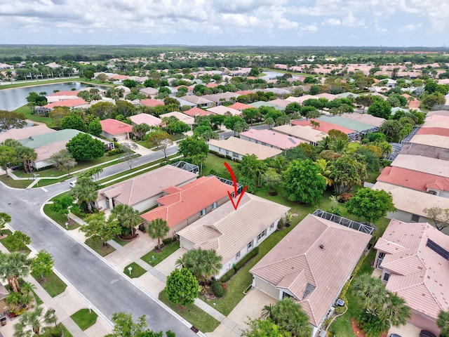aerial view with a residential view and a water view