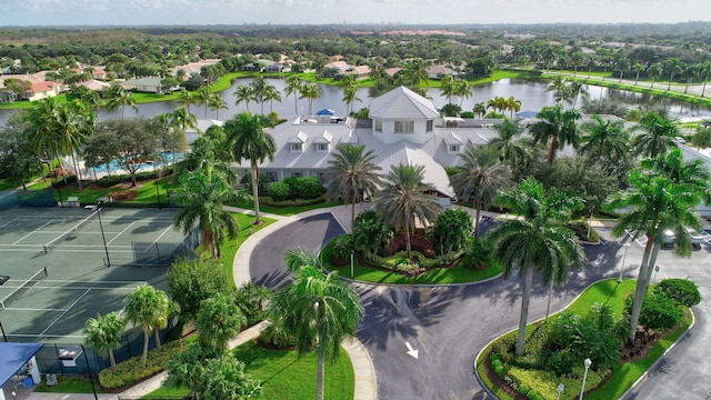 birds eye view of property with a water view and a residential view