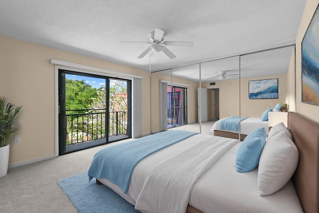 3203 Meridian Way N Unit D, Palm Beach Gardens, FL 33410 - carpeted bedroom featuring access to exterior, baseboards, and ceiling fan