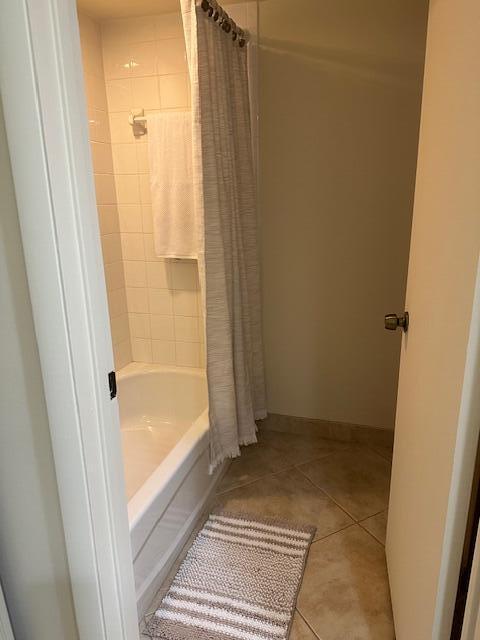 3203 Meridian Way N Unit D, Palm Beach Gardens, FL 33410 - full bathroom featuring tile patterned flooring and shower / tub combo