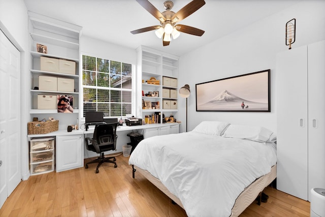 bedroom featuring light wood finished floors and a ceiling fan