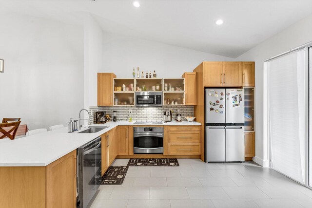 kitchen with a sink, open shelves, tasteful backsplash, beverage cooler, and stainless steel appliances