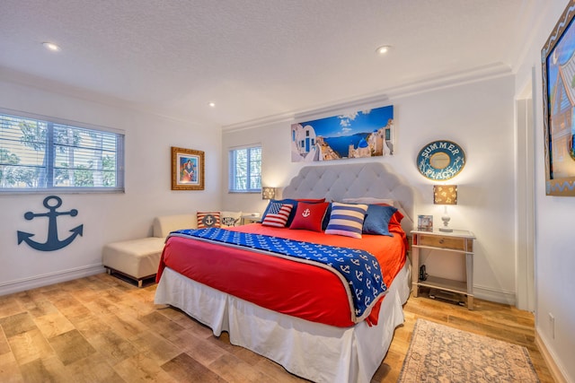 1199 Hillsboro Mile Unit 119, Hillsboro Beach, FL 33062 - bedroom with recessed lighting, ornamental molding, and wood finished floors