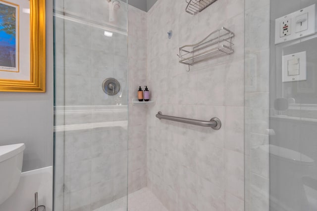 1199 Hillsboro Mile Unit 119, Hillsboro Beach, FL 33062 - bathroom featuring toilet and a shower stall