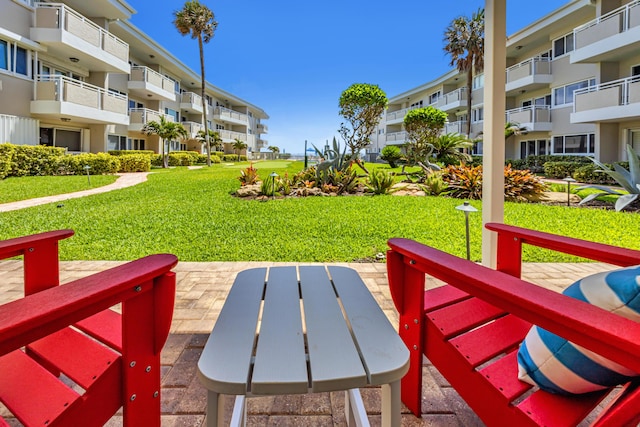 1199 Hillsboro Mile Unit 119, Hillsboro Beach, FL 33062 - surrounding community with a yard