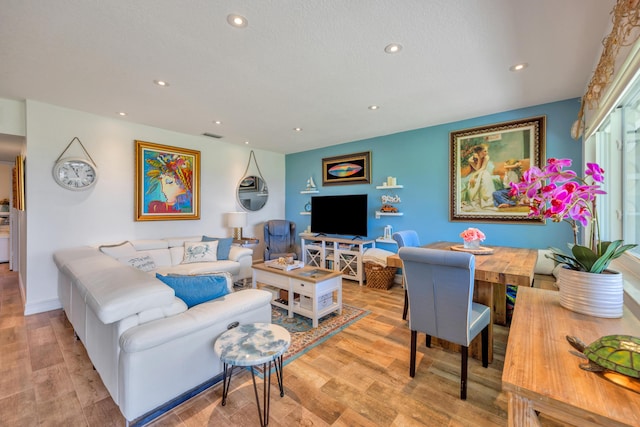 1199 Hillsboro Mile Unit 119, Hillsboro Beach, FL 33062 - living area featuring recessed lighting and wood finished floors