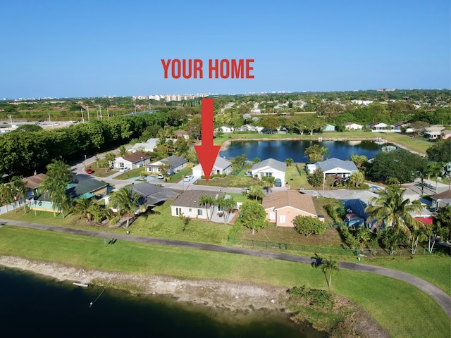 bird's eye view with a water view and a residential view