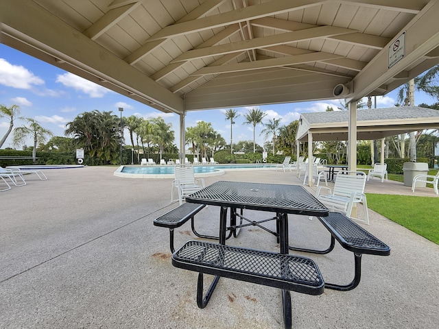 view of patio / terrace featuring a gazebo and a community pool