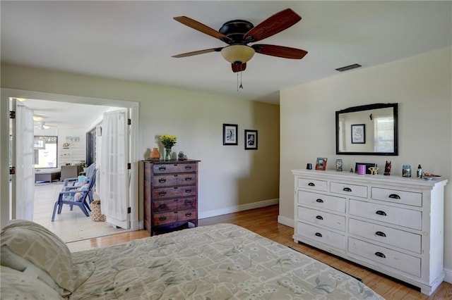 1090 31st Ave, Vero Beach, FL 32960 - bedroom featuring baseboards, visible vents, light wood-style floors, and a ceiling fan