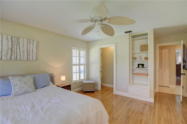 1090 31st Ave, Vero Beach, FL 32960 - bedroom featuring baseboards, visible vents, ceiling fan, and light wood-style flooring
