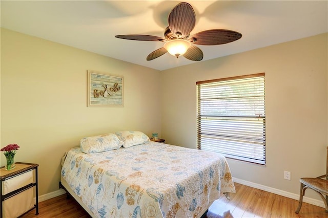 1090 31st Ave, Vero Beach, FL 32960 - bedroom featuring baseboards, wood finished floors, and ceiling fan