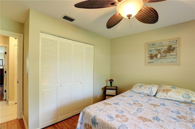 1090 31st Ave, Vero Beach, FL 32960 - bedroom with visible vents, a closet, light wood-style flooring, and a ceiling fan