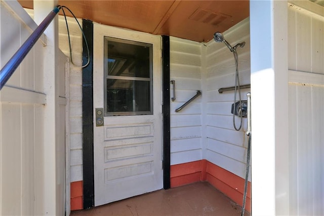 1090 31st Ave, Vero Beach, FL 32960 - doorway to property featuring visible vents