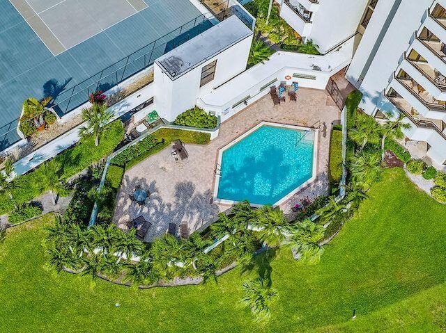 3322 Casseekey Island Rd Unit 104, Jupiter, FL 33477 - drone / aerial view of a pool area