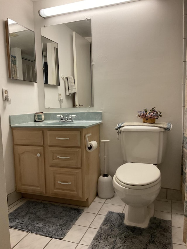 337 Knotty Pine Cir Unit B-1, Greenacres, FL 33463 - full bath featuring toilet, vanity, and tile patterned floors