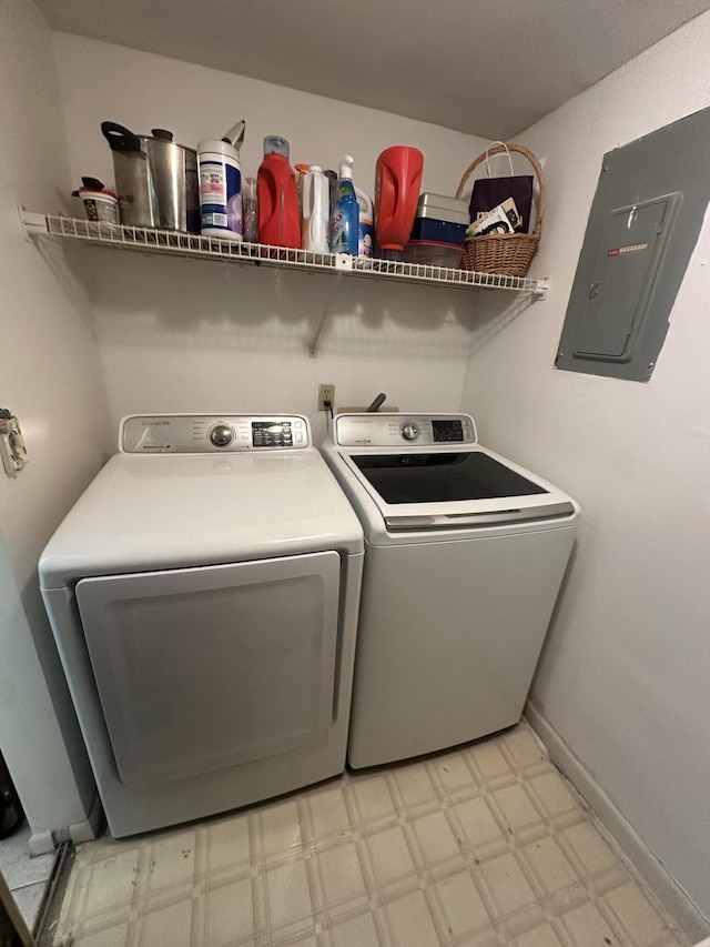 337 Knotty Pine Cir Unit B-1, Greenacres, FL 33463 - laundry area featuring electric panel, washer and clothes dryer, light floors, laundry area, and baseboards