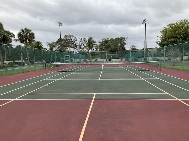 337 Knotty Pine Cir Unit B-1, Greenacres, FL 33463 - view of tennis court with community basketball court and fence