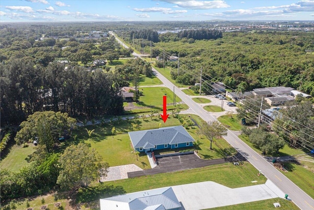 1200 Hartman Rd, Fort Pierce, FL 34947 - aerial view of property and surrounding area with a forest