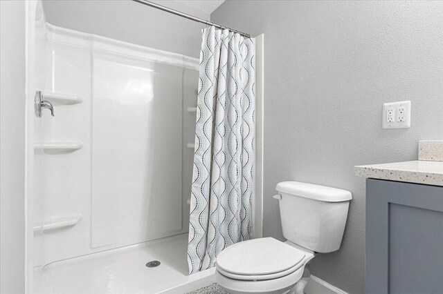 1200 Hartman Rd, Fort Pierce, FL 34947 - bathroom with a shower stall, toilet, and vanity