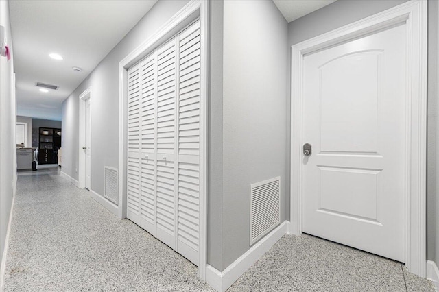1200 Hartman Rd, Fort Pierce, FL 34947 - corridor with baseboards, speckled floor, and recessed lighting
