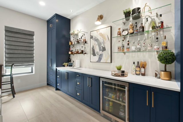 bar featuring a dry bar, wine cooler, baseboards, and recessed lighting