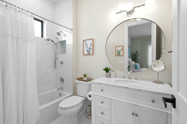 bathroom with shower / tub combo, vanity, and toilet