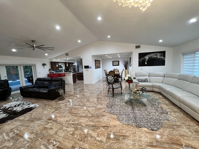living area with lofted ceiling, light marble finish floors, ceiling fan, and recessed lighting